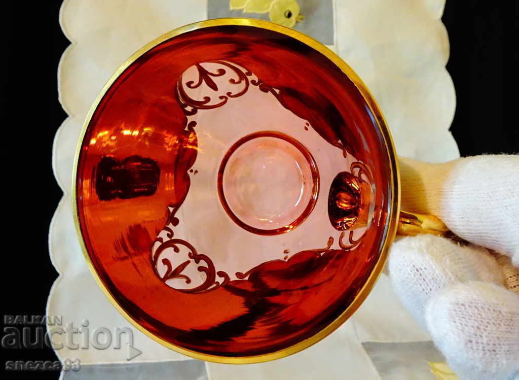 Delivery of Bohemia crystal glass with saucer, gold. Delivery of Bohemia crystal glass with saucer, gold.
