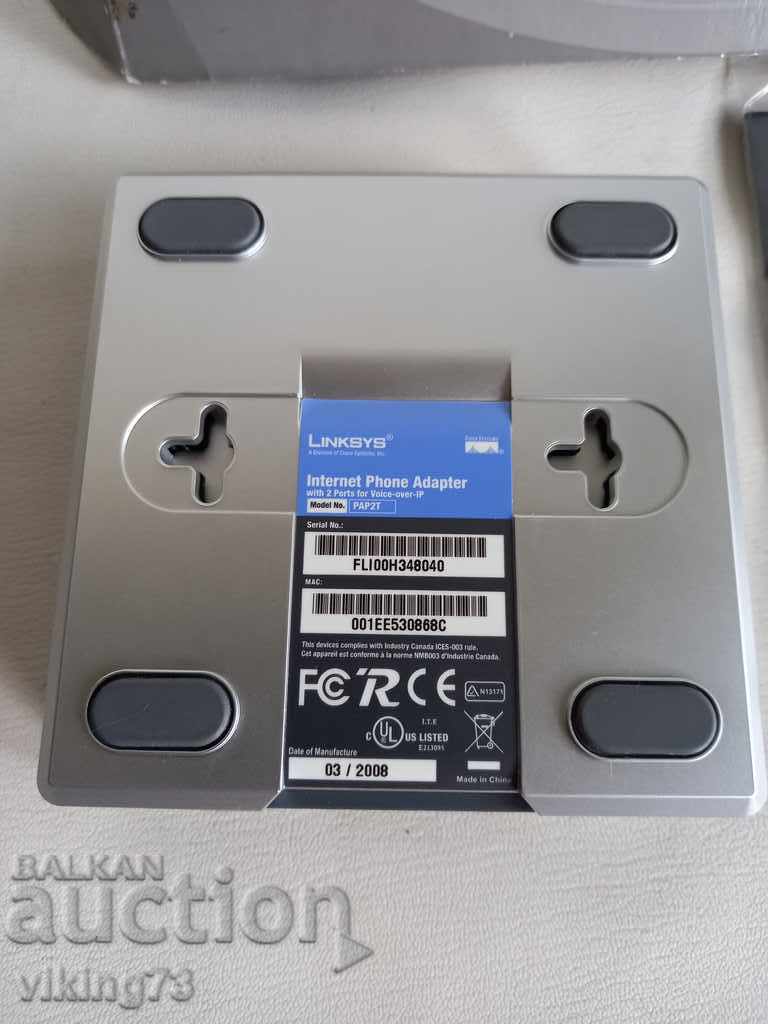 Auction Internet telephone adapter with LINKSYS / NetWorx disk Auction Internet telephone adapter with LINKSYS / NetWorx disk