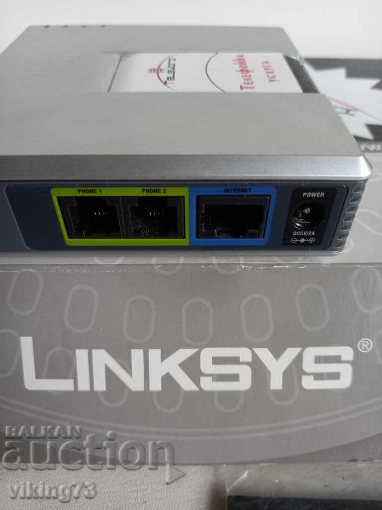 Delivery of Internet telephone adapter with LINKSYS / NetWorx disk Delivery of Internet telephone adapter with LINKSYS / NetWorx disk