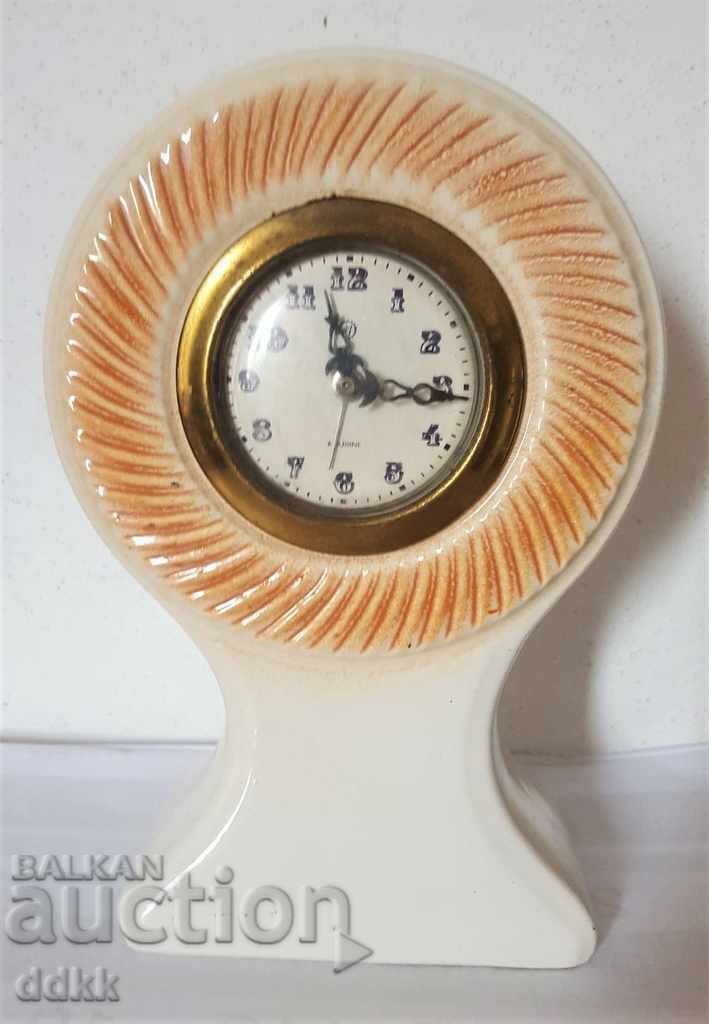 Old porcelain clock with markings