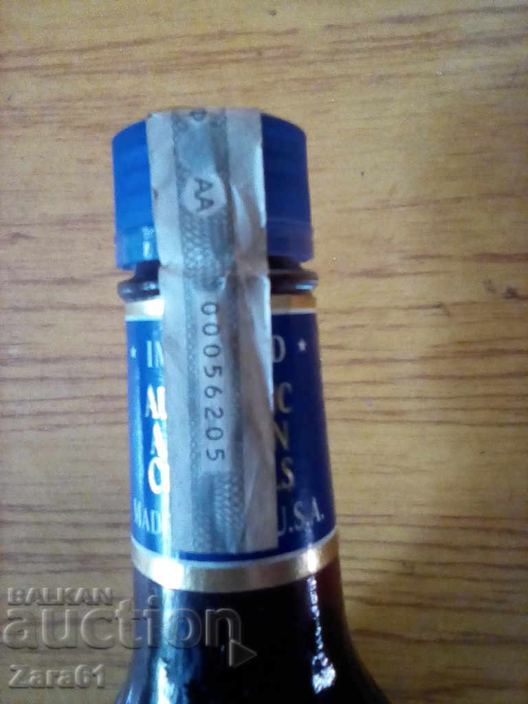 Delivery of A bottle of alcohol from the last century Delivery of A bottle of alcohol from the last century