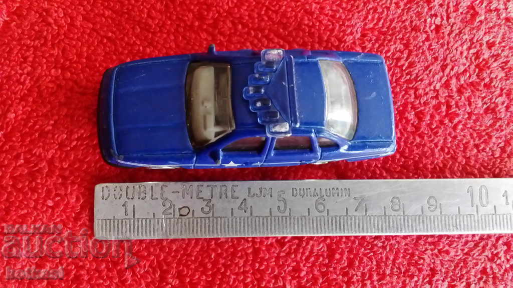 Old small solid metal car