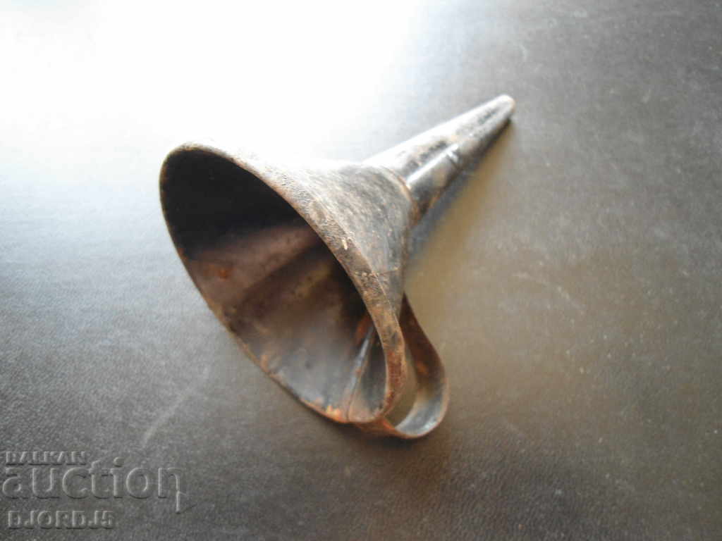 An old metal funnel