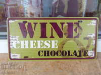 Metal plate number wine cheese chocolate gourmet appreciated white