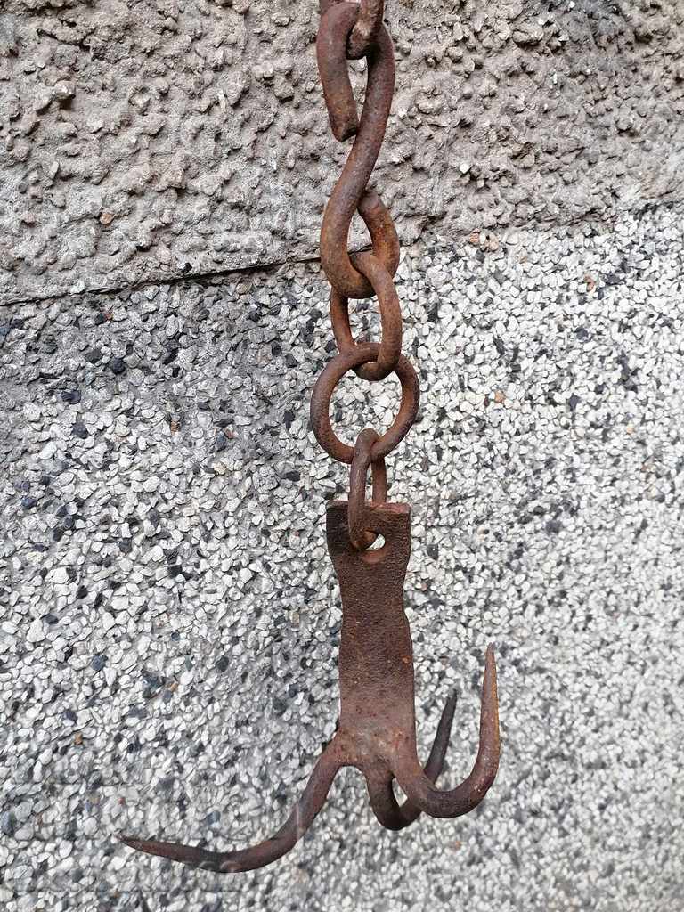 An antique forging hook, triple harness