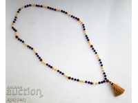 Old long rosary necklace string with stones and nuts