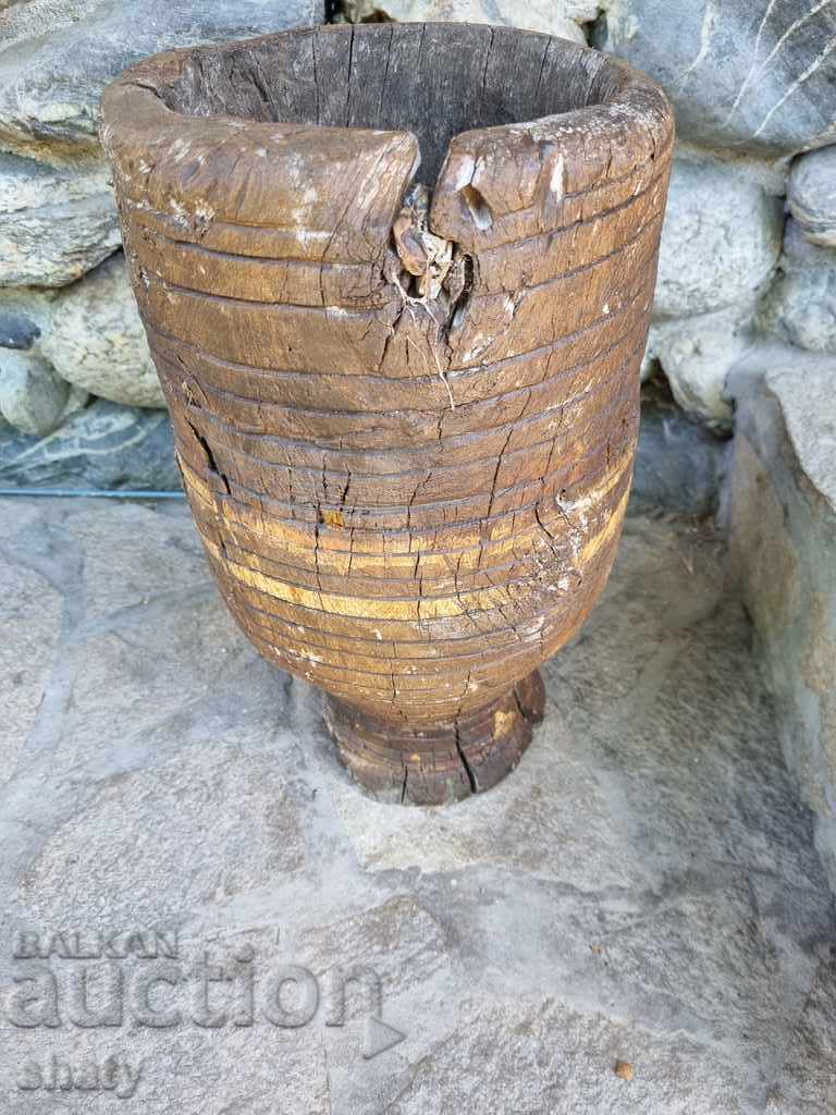 Old wooden vessel. hammer. Chutura