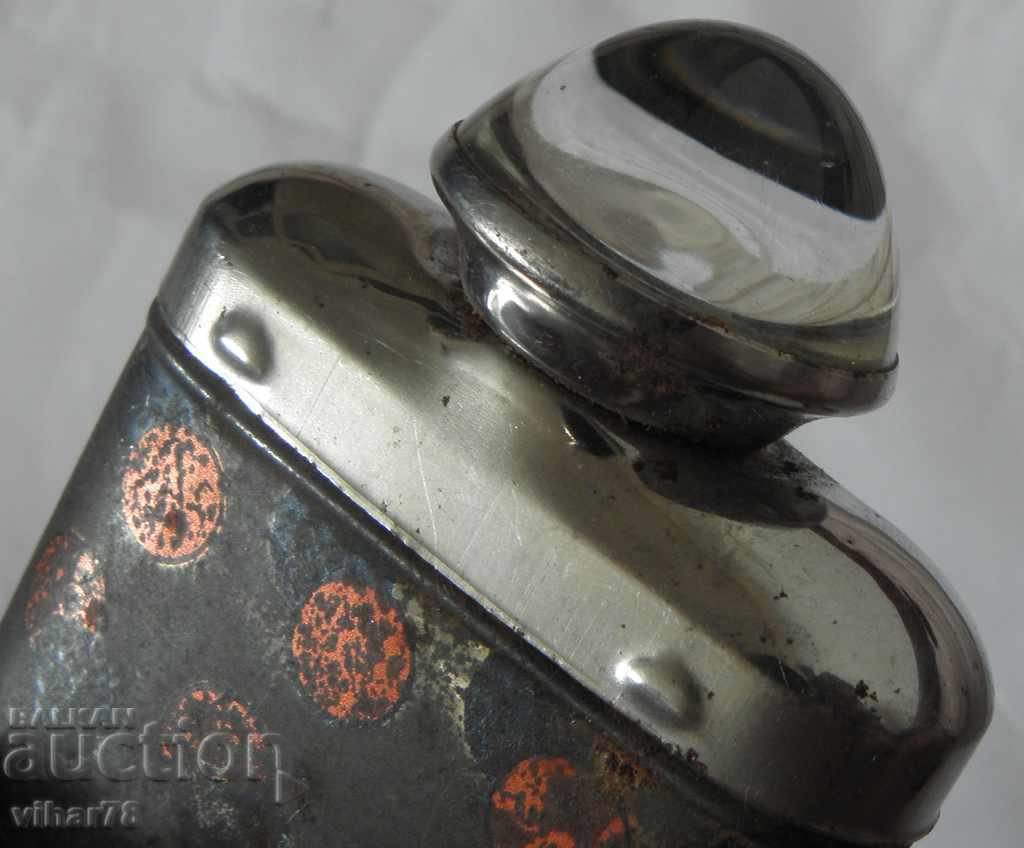 Old lantern with a magnifying glass