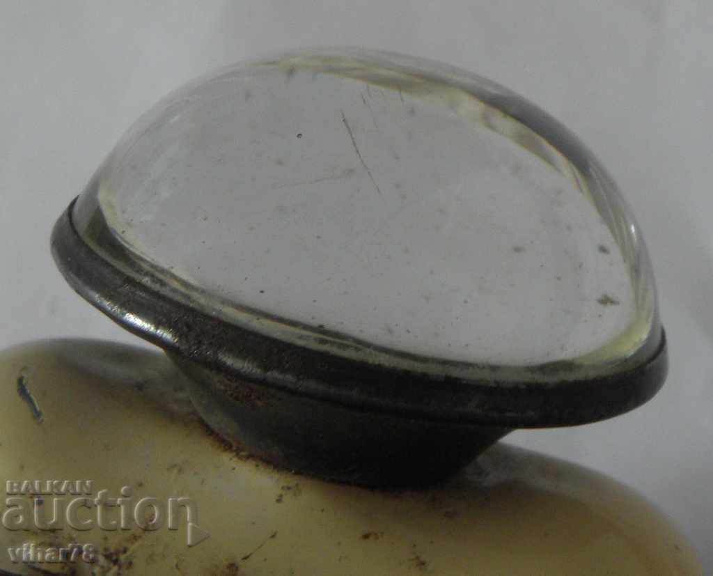 Auction  Old lantern with a magnifying glass