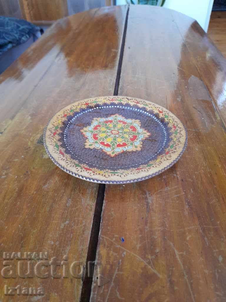 An old wooden plate