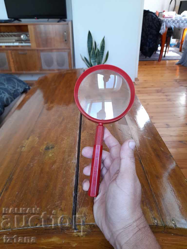 Delivery of Old magnifying glass Delivery of Old magnifying glass