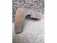 An old ax shaft tool wrought iron