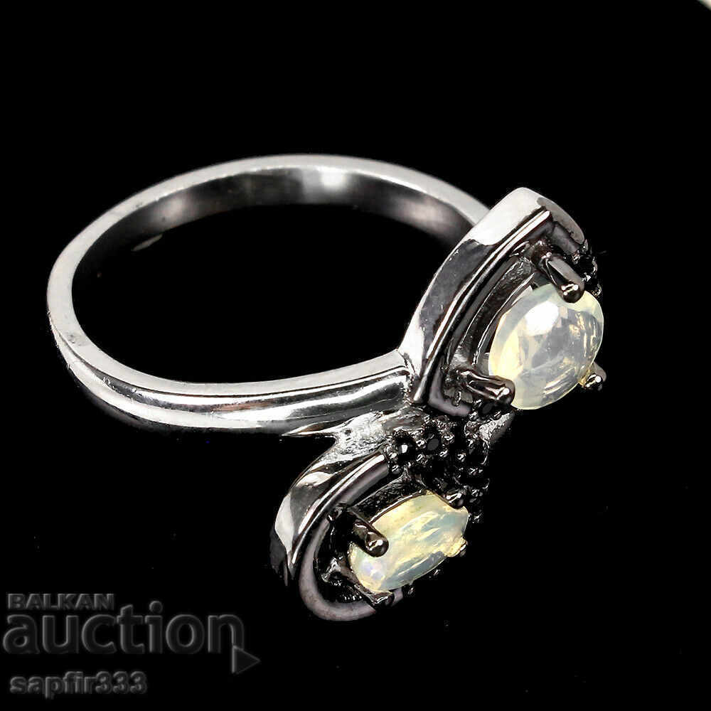 Auction LUXURY ELEGANT RING FIRE OPALS AND SPINEL Auction LUXURY ELEGANT RING FIRE OPALS AND SPINEL