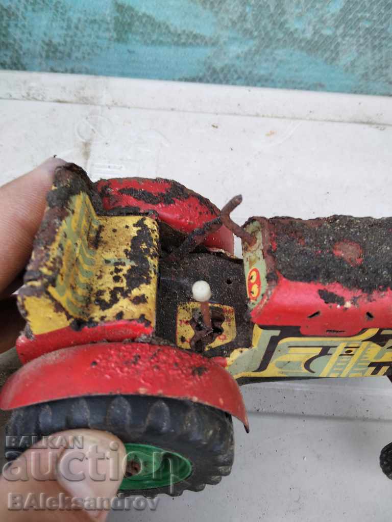 An old uncleaned tin toy - 5