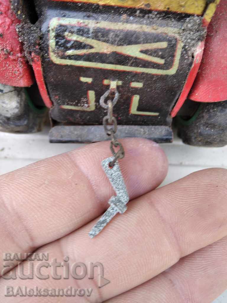 An old uncleaned tin toy - 6