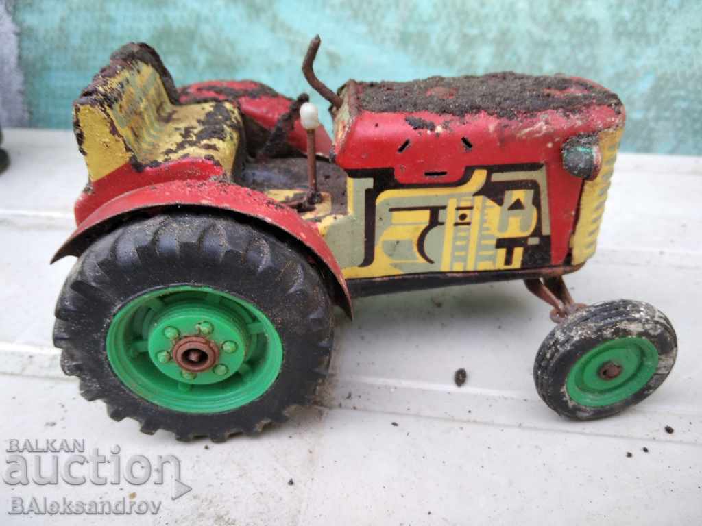 An old uncleaned tin toy - 7