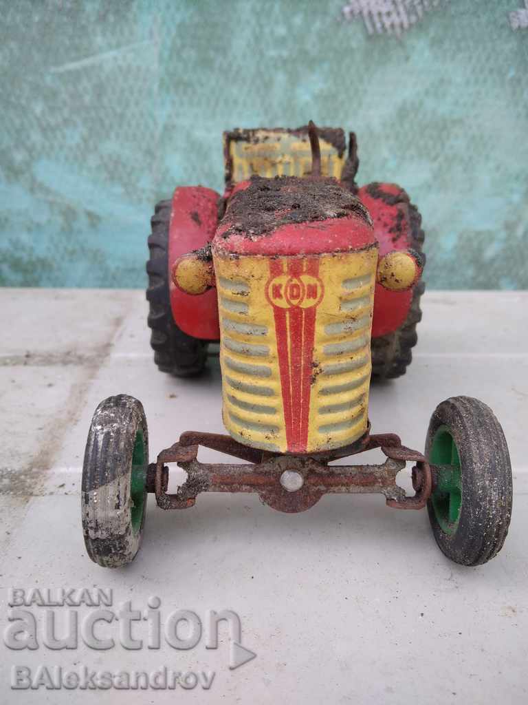 An old uncleaned tin toy
