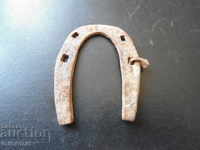 A small horseshoe for good luck