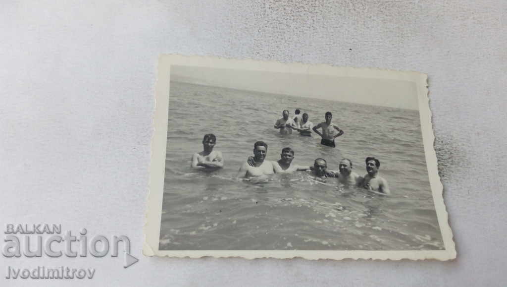 Photo Men in the water