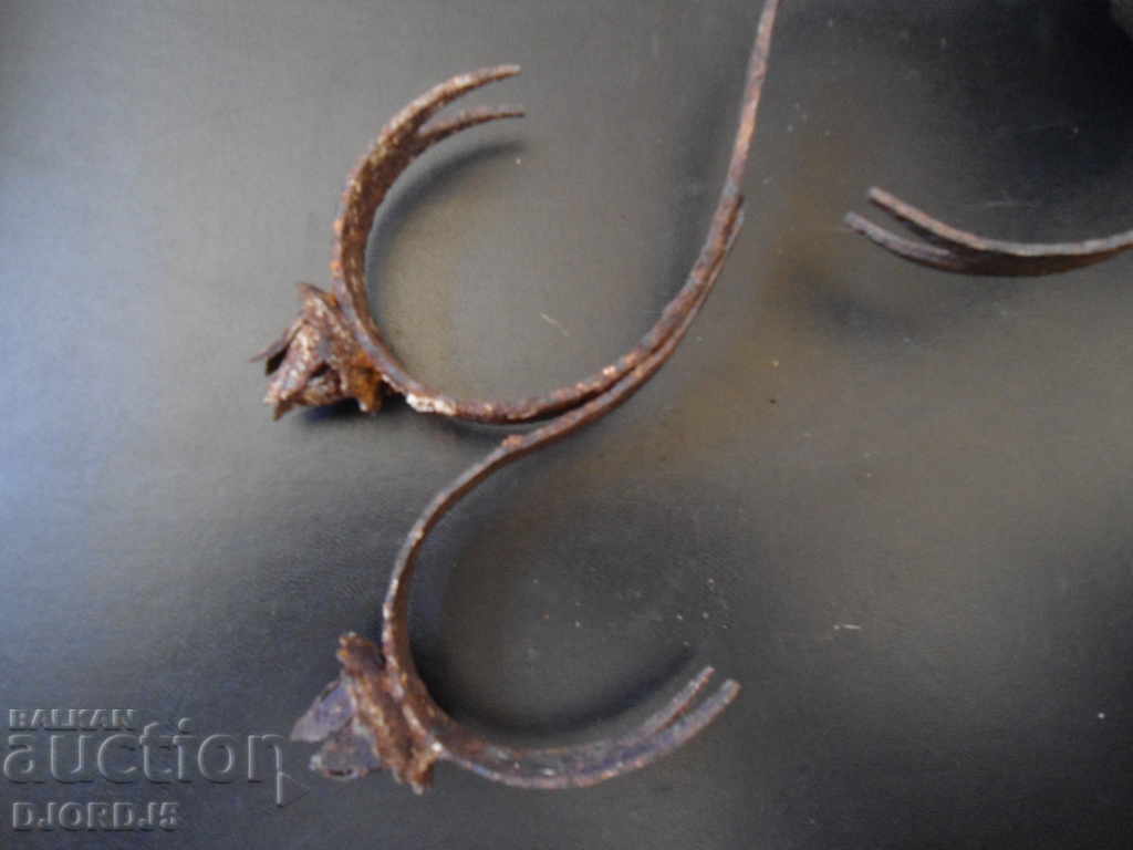 Delivery of An old forged candlestick Delivery of An old forged candlestick