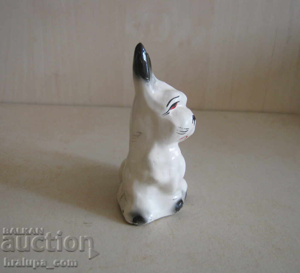 Delivery of Old ceramic figure of a dog Delivery of Old ceramic figure of a dog