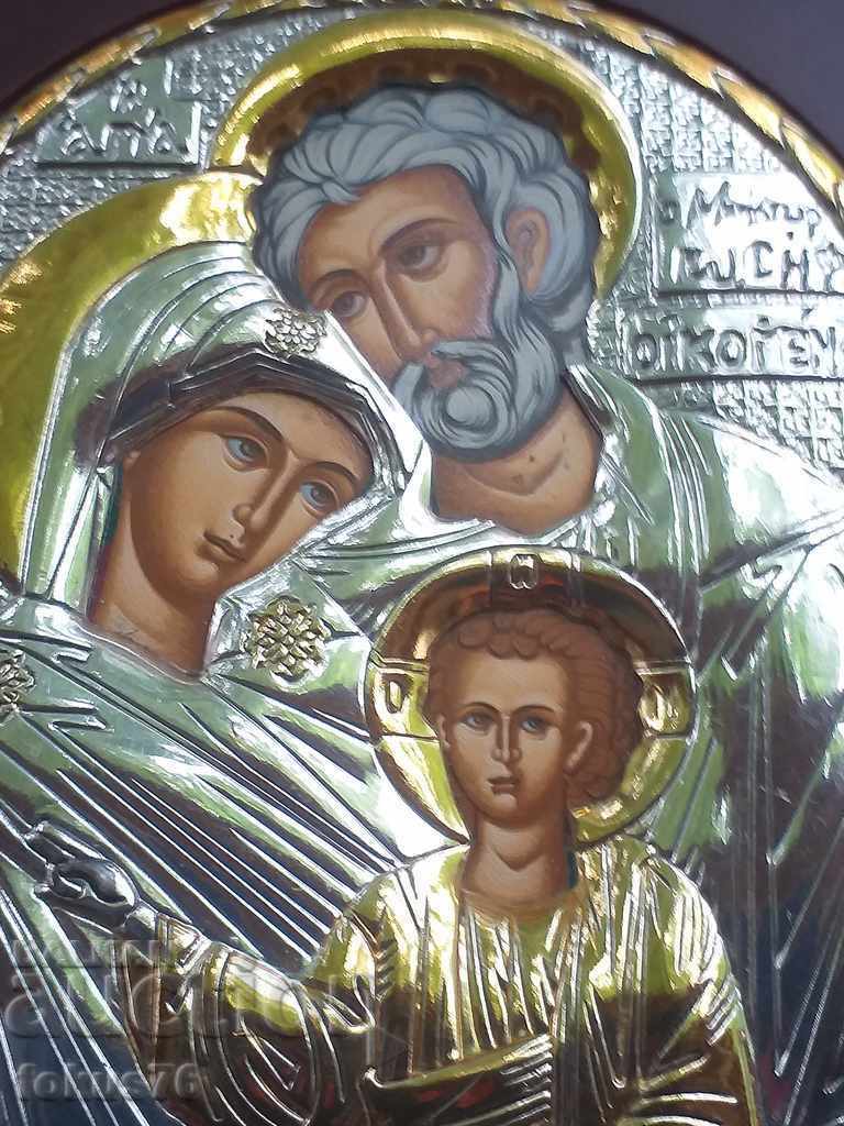 A beautiful silver icon with gilding and a certificate
