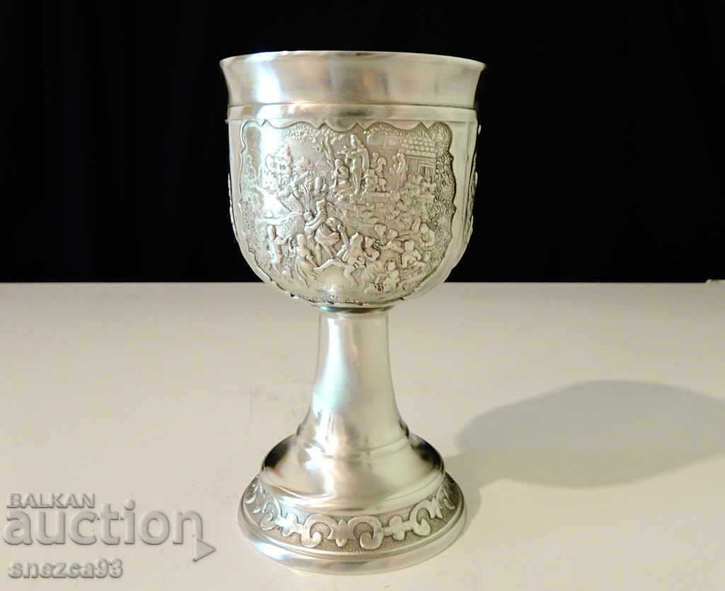 Delivery of Pewter wine glass, embossed rural scenes, author's work Delivery of Pewter wine glass, embossed rural scenes, author's work