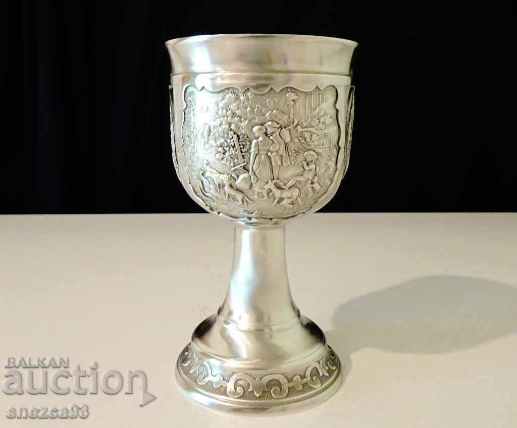 Pewter wine glass, embossed rural scenes, author's work Pewter wine glass, embossed rural scenes, author's work