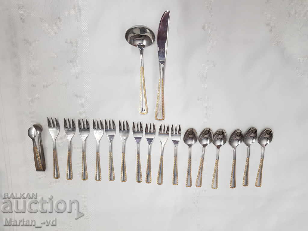 Cutlery with gilded element