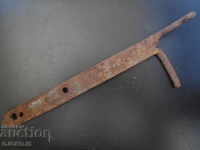 Old wrought iron, latch, mandala, gate