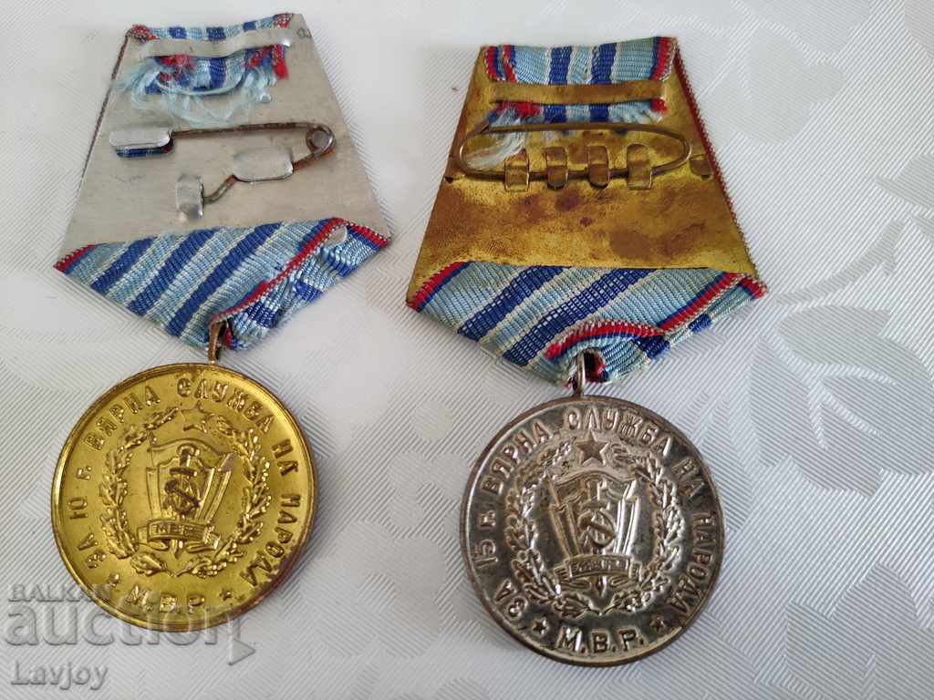 Medals for 10 and 15 years of faithful service to the people M.V.R. with price 30.00 BGN | € 15.34 Medals for 10 and 15 years of faithful service to the people M.V.R. with price 30.00 BGN | € 15.34