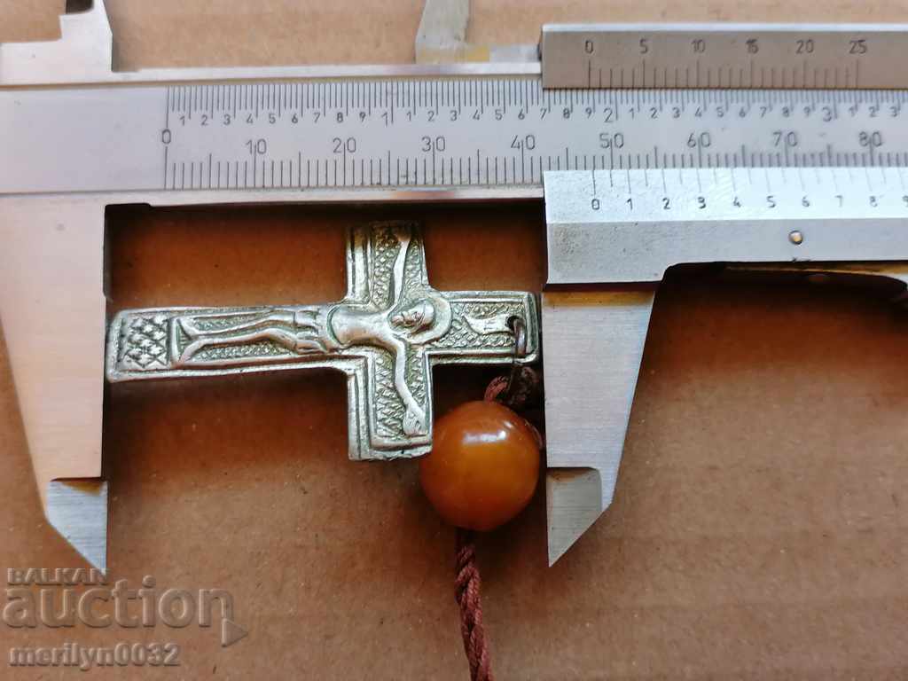 Auction  Silver cross, carved cross, amber bead, from a grandmother, a Hadji