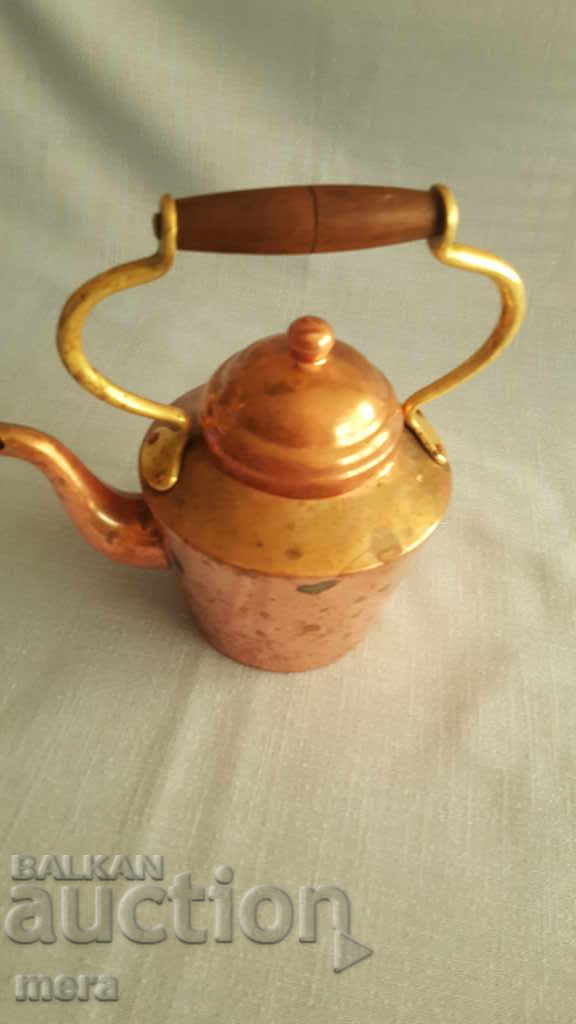 Bronze teapot with brass handle with price 35.00 BGN | € 17.90 Bronze teapot with brass handle with price 35.00 BGN | € 17.90