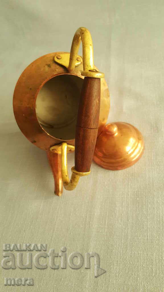 Delivery of Bronze teapot with brass handle Delivery of Bronze teapot with brass handle