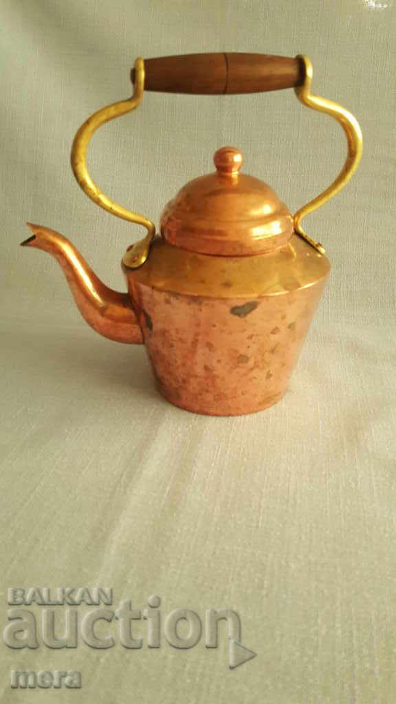 Bronze teapot with brass handle