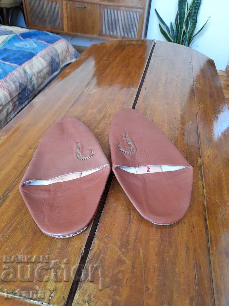 Old women's leather slippers, slippers