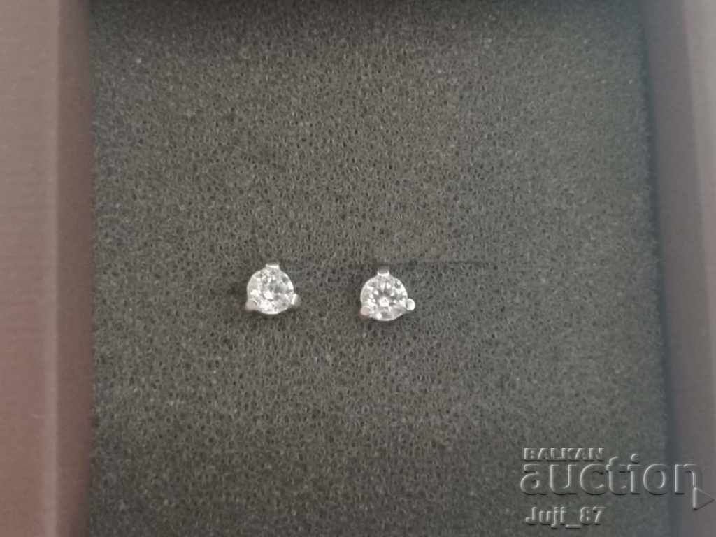 New silver earrings with zircon
