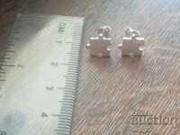 New silver earrings puzzle