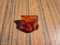 old amber brooch made of natural amber