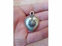 The old silver plated locket