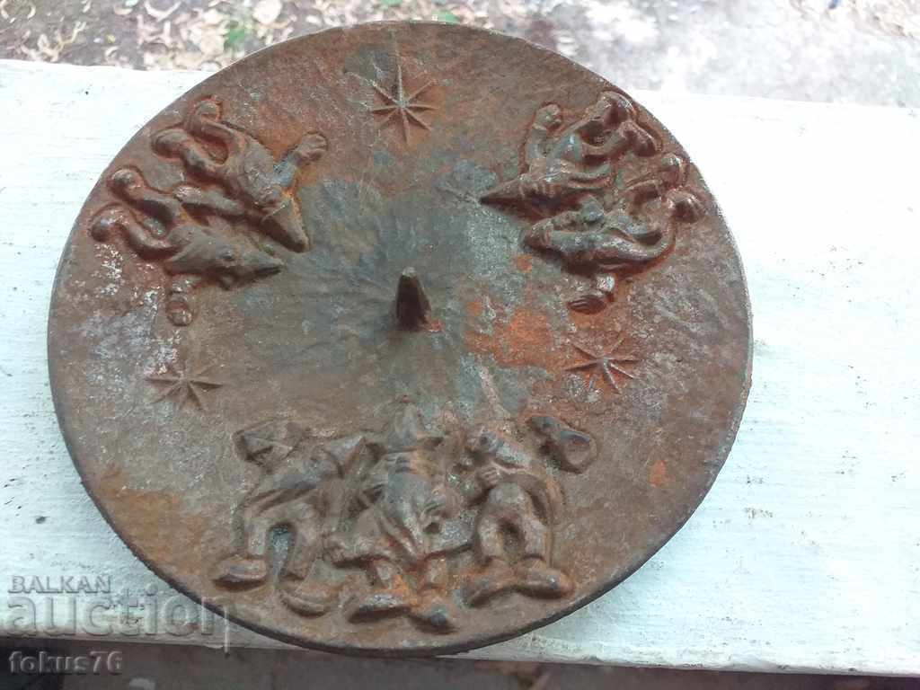 Wonderful cast iron candlestick plate with ornaments