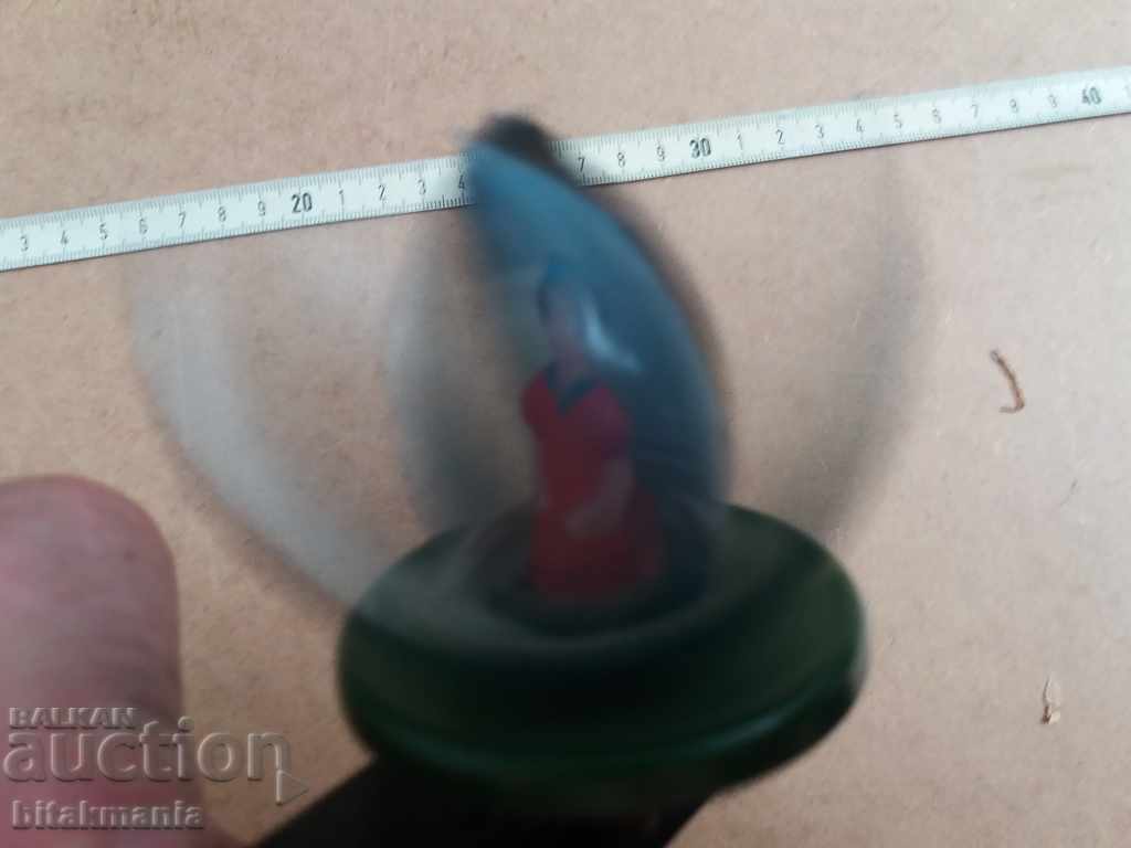 Auction  Old mechanical toy - a dissolving lily