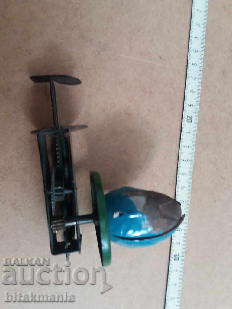 Delivery of Old mechanical toy - a dissolving lily