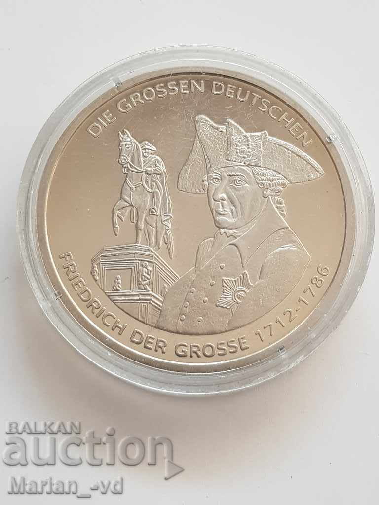 Silver coin in a capsule of Frederick the Great