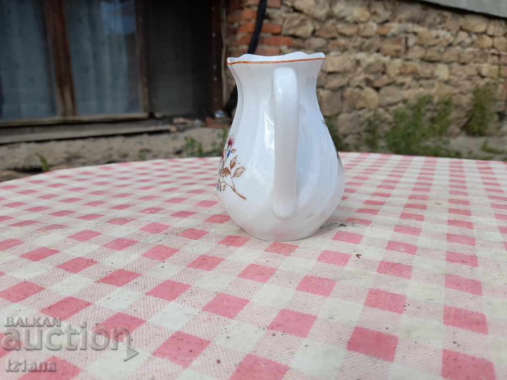 An old porcelain jug, a jug with price 12.00 BGN | € 6.14 An old porcelain jug, a jug with price 12.00 BGN | € 6.14