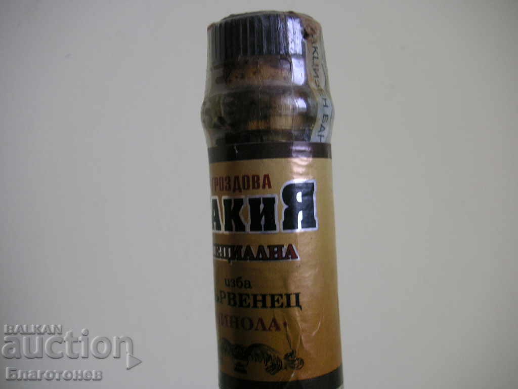 Auction A bottle of brandy Auction A bottle of brandy