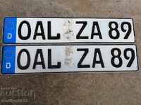 Ένα ζευγάρι αριθμών, αριθμός κυκλοφορίας από πινακίδα μηχανοκίνητου οχήματος