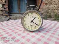 Old table clock, alarm clock Rodina