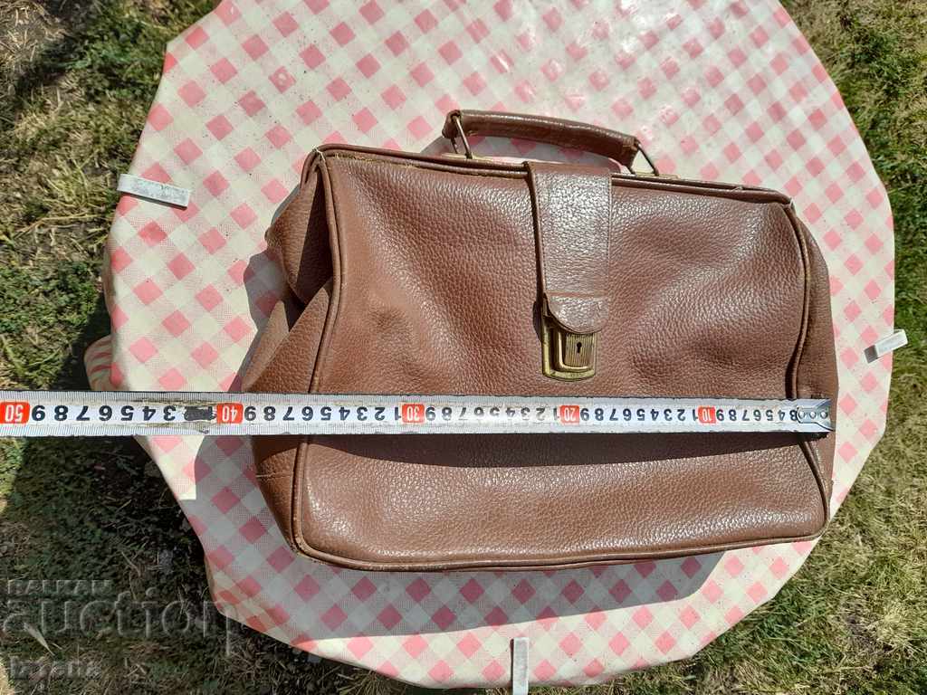 Delivery of An old leather bag Delivery of An old leather bag