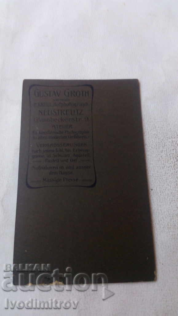 Photo Woman in black cardboard dress with price 5.45 BGN | € 2.79 Photo Woman in black cardboard dress with price 5.45 BGN | € 2.79